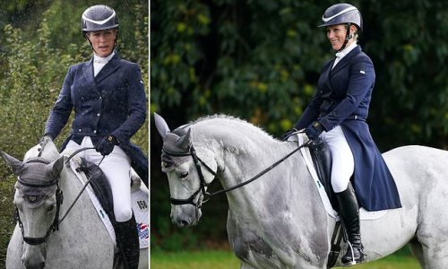Back in the saddle! Zara Tindall braves the wet weather to take part in the Osberton International and Young Horse Championships in her first outing since the Queen's funeral