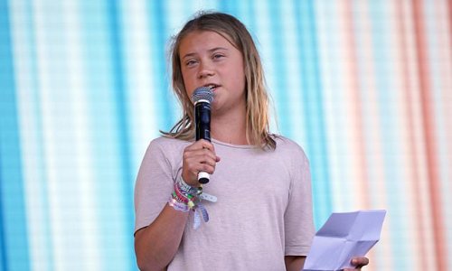 Greta Thunberg ditches the foul language in sober speech to Glastonbury warning of a ‘total natural catastrophe’ driven by the ‘forces of greed’