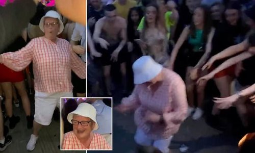 Living her best life! Social media goes wild for 'gran in a hat' filmed as she dances wildly to Calvin Harris at Wireless Festival