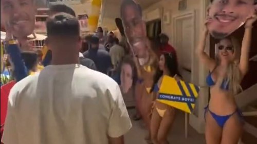 Inside Leeds' Vegas promotion party: Former Man United star leads the celebrations with bikini-clad hosts - and giant cut-outs of players' faces!
