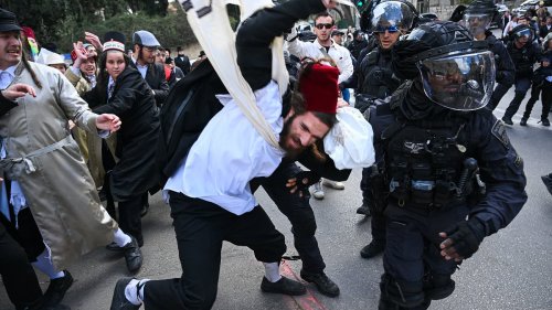 Riot cops clash with ultra-orthodox Jews amid violent scenes in Jerusalem as city holds first...