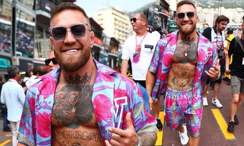 Conor McGregor flashes his tattooed chest in a patterned silk co-ord as he arrives at the F1 Grand Prix of Monaco