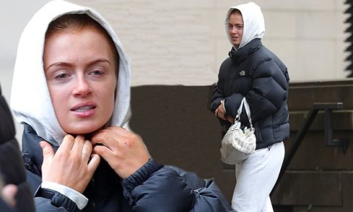 Maisie Smith faces the big freeze in a grey tracksuit and black quilted