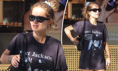 Makeup free Rita Ora wears her favourite Janet Jackson tour T-shirt over a pair of tiny bike shorts as she steps out in Double Bay