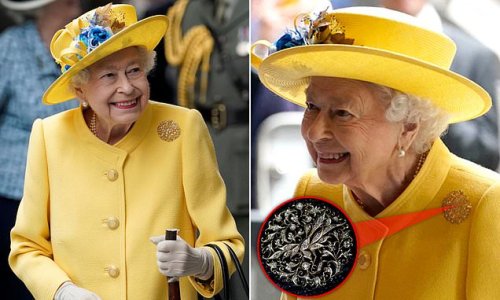 Brooching the subject! Queen dons a diamond and gold bird of paradise pin gifted to her by the government of Singapore for her Diamond Jubilee to open the Elizabeth line in Paddington