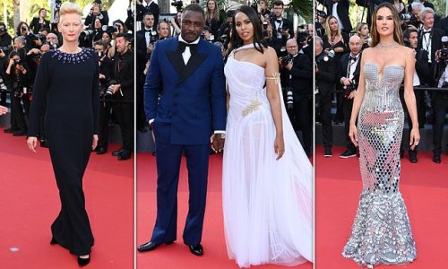 Idris Elba puts on a loved-up display with his wife Sabrina who stuns in an elegant lilac gown as they join Tilda Swinton at the Three Thousand Years of Longing premiere during the Cannes Film Festival