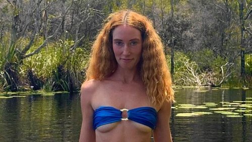 Married At First Sight bride wears a VERY revealing bikini as she frolics in the water with her fiancé