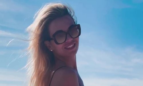 'Life is short and sometimes crazy': Newly-single Christine McGuinness poses in bikini as she shares poignant Instagram video and reveals her beloved grandmother has died