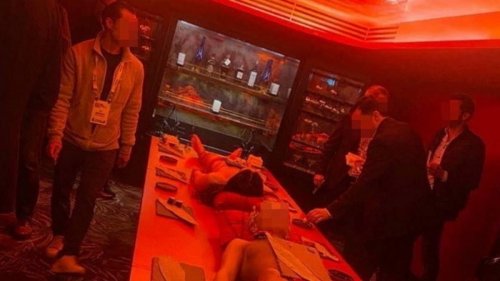 Cryptocurrency firm apologises after hosting party where guests ate sushi from semi-naked models in...