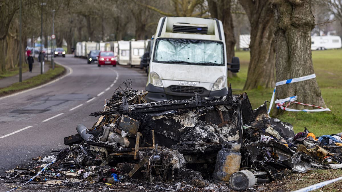 EXCLUSIVEFear and loathing in our increasingly violent 'caravan city': Van dwellers arm themselves with axes and baseball bats as tensions flare with locals after 'arson' attack on motorhome