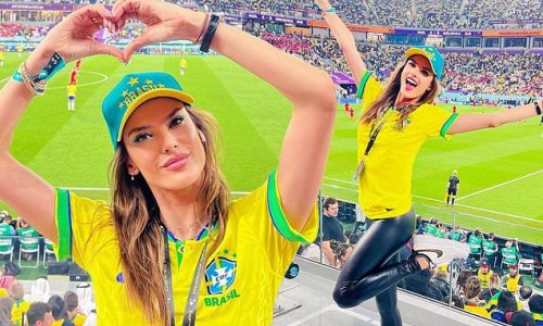 Alessandra Ambrosio wears her nation's colours with wet look leggings while supporting Brazil in their World Cup match against Croatia in Qatar