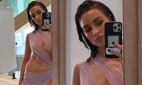 Olivia Culpo showcases her flawless physique while rocking a sultry sheer dress in a sizzling selfie