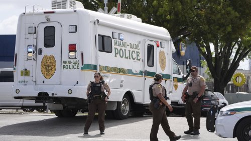 Gunman shoots car mogul half-brother dead at his own dealership over 'misunderstanding'