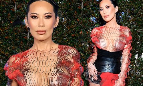 Bling Empire star Christine Chiu, 40, puts on an eye-popping display as she goes bra-free in a see-through netted dress at Fashion Trust event