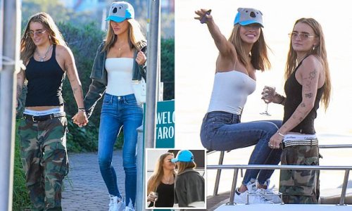 Sealed with a kiss! Selling Sunset star Chrishell Stause and G Flip bring their high profile romance Down Under with the couple spotted getting intimate after an outing to Sydney's Taronga Zoo