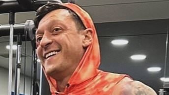 Former Arsenal star Mesut Ozil is BARRED from return to his former club 'over links to far-right Turkish group' who once tried to assassinate the Pope - and whose emblem he has tattooed on him