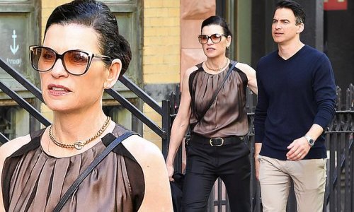 Julianna Margulies steps out in style on a RARE sighting with husband Keith Lieberthal for stroll together in New York City