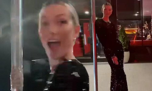 Karlie twirls around in sequined Prada gown and Manolo Blahnik boots
