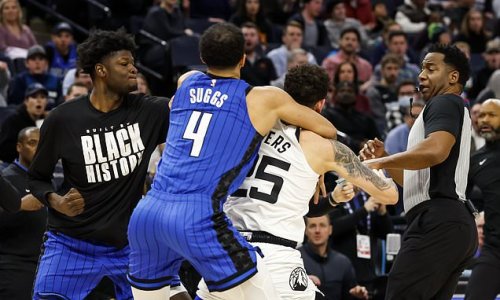 Mo Bamba and Austin Rivers throw PUNCHES at each other and spark a huge bench-clearing brawl during the Magic-Timberwolves game - and fight leads to FIVE players being ejected!