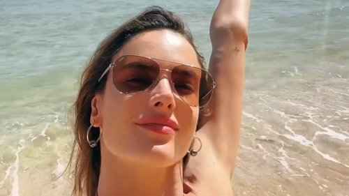 Bikini-clad Alessandra Ambrosio, 42, puts on an eye-popping display in a skimpy burnt orange...