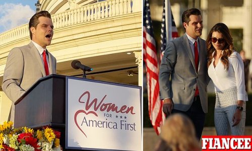 'I'm built for the battle and I'm not going anywhere!' Defiant Matt Gaetz is flanked by his fiancée at Pro-Trump women's summit as he dismisses sex trafficking allegations as 'smears' and 'wild conspiracy theories'
