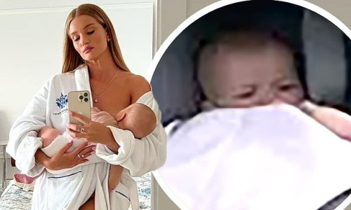 Rosie Huntington-Whiteley looks radiant as she breastfeeds daughter Isabella, 15 months, in candid snaps