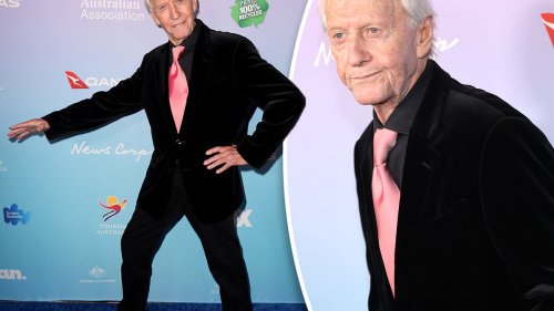 Paul Hogan looks very animated on the red carpet at the G'Day USA Arts Gala after being wheelchair...