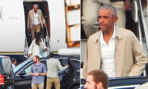 EXCLUSIVE: The Obama's Down Under! Barack and Michelle are seen together for the first time in five months as they arrive in Sydney after traveling from US on private jet