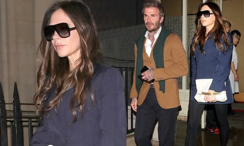 Victoria Beckham Puts On A VERY Leggy Display In A Navy Mini Dress And ...