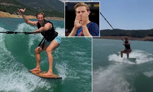 Frenkie de Jong cuts a relaxed figure while wakeboarding as the Barcelona star closes in on a drawn-out move away to Chelsea after Manchester United admitted defeat in their pursuit of the Dutch midfielder