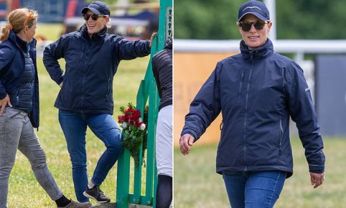 Countryside casual! Zara Tindall sports jeans and sunglasses as she inspects the jumping course at the Houghton International Horse Trials