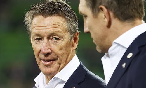 Craig Bellamy FINALLY ends months of uncertainty and commits his future to Melbourne Storm after signing one-year extension to stay at the club - and fans have Andrew Johns to thank for keeping the supercoach on board
