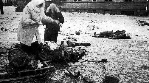 The horror Siege of Leningrad: How 1.5million people died during Nazi starvation blockade that saw mothers resort to feeding their babies BLOOD and families turn to cannibalism - but Vladimir Putin's mum survived