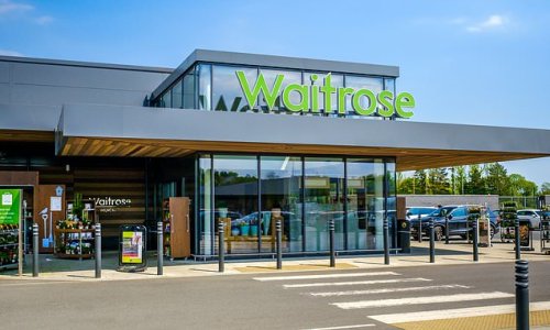 Waitrose shelves are pictured empty in stores across Britain over Bank Holiday weekend 'due to an IT failure'