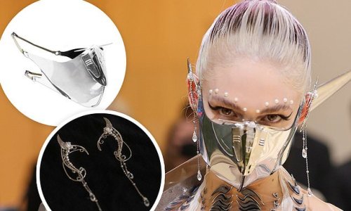 Grimes auctioning off her Met Gala mask and earrings to 'help get BIPOC families out of Ukraine'