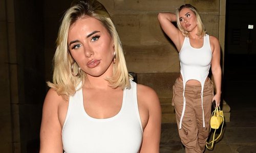 Love Island's Ellie Brown slips into a tight white vest top