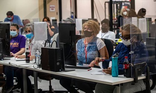 Arizona secretary of state blasts election critics for 'screaming fraud with no evidence' as Biden's lead there shrinks to 20,000 votes