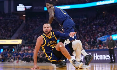 Steph Curry limps to locker room and will undergo an MRI after appearing to injure his left leg on a play that sent him hopping into the stands in a huge blow to the Warriors