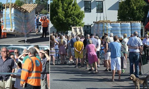 Water chaos in Surrey as residents are forced to queue up for bottles after 'technical issues' caused the taps to run dry at hundreds of homes a day after drought was officially declared