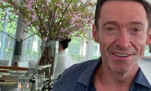 Cheers to that! Hugh Jackman send his female fans into a frenzy as handsome star shares a video of himself enjoying a cocktail