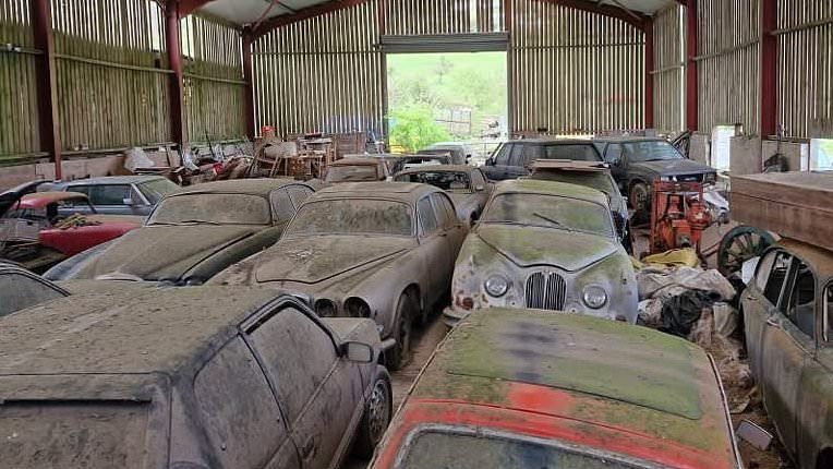 EXCLUSIVESecret Aladdin's cave of 180 classic cars hidden in the English countryside for years is uncovered - and could now fetch eccentric owner a fortune