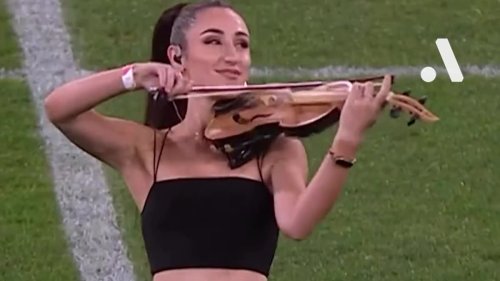 Glamorous violinist reveals a VERY surprising detail about her stunning performance of rock classic...