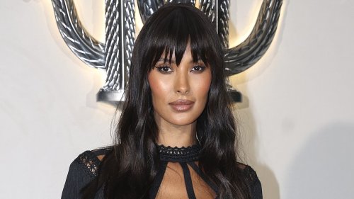 Maya Jama stuns in a semi-sheer cut-out dress after changing out of a silver jumpsuit as she attends...