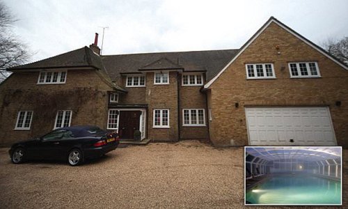 Guest at sex party mansion dubbed 'Kinky Towers' is quizzed over 'murder' after 'unexplained' death of man in his 20s whose body was found in the swimming pool