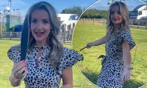 'I really enjoyed that! Helen Skelton flashes a smile while showing off her knife throwing skills... after reflecting on a 'rough time' following her split from husband Richie Myler