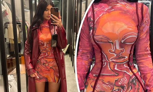 Kylie Jenner showcases her legs and curves in tight mini dress