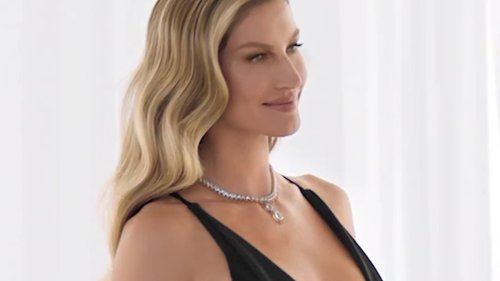 Gisele Bundchen lets her chest do the talking as she goes bra-free while almost SPILLING out of a...