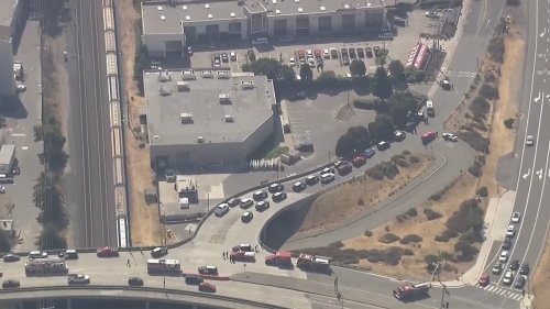'Two people have been shot' at Toyota Service Center in Berkeley, California after 'multiple police' exchange gunfire with a suspect, as threat is downgraded