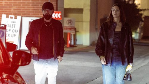 Leonardo DiCaprio, 49, covers up with a mask as he steps out with girlfriend Vittoria Ceretti, 25,...