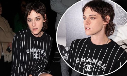 Kristen Stewart wears a baseball jumper and bouclé mini skirt as she continues to rock her brunette mullet at Chanel show during PFW